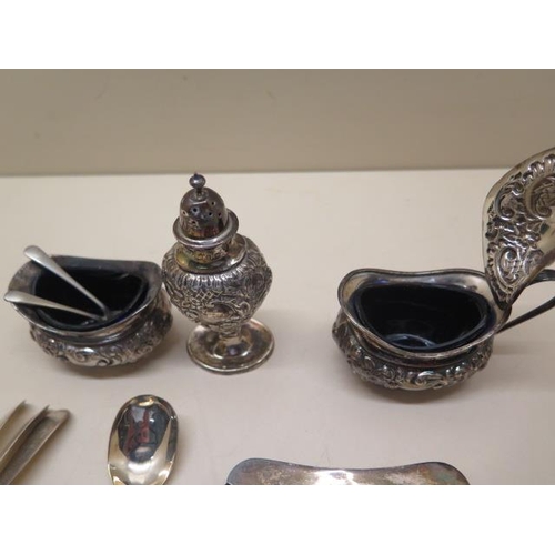 420 - 8 silver teaspoons, a mustard spoon, a silver cruet set and a silver ashtray, total silver weight ap... 