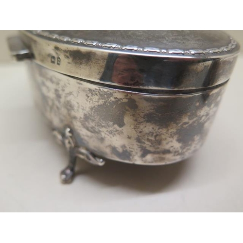 423 - An oval silver jewellery trinket box 6cm tall x 15cm x 10cm, a shaped silver mustard - liner broken ... 