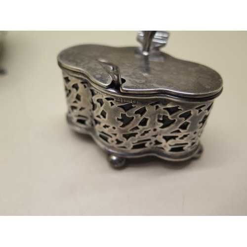 423 - An oval silver jewellery trinket box 6cm tall x 15cm x 10cm, a shaped silver mustard - liner broken ... 