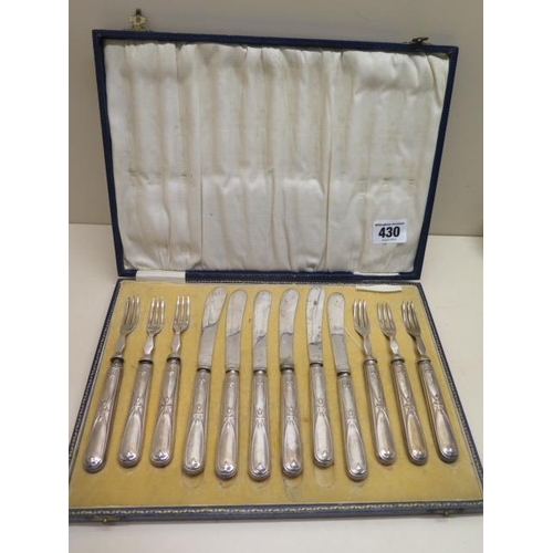 430 - A set of 6 dessert knives, 6.5cm long, and 3 prong forks, 6cm, in original blue box, silver handles ... 