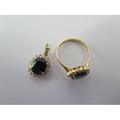 471 - An 18ct yellow gold sapphire and diamond ring, size N, approx 3.8 grams, with matching 18ct pendant,... 