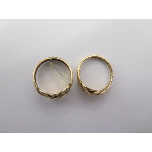 472 - Two gold puzzle rings, size J, one has been fixed together, the other is missing stones, total weigh... 