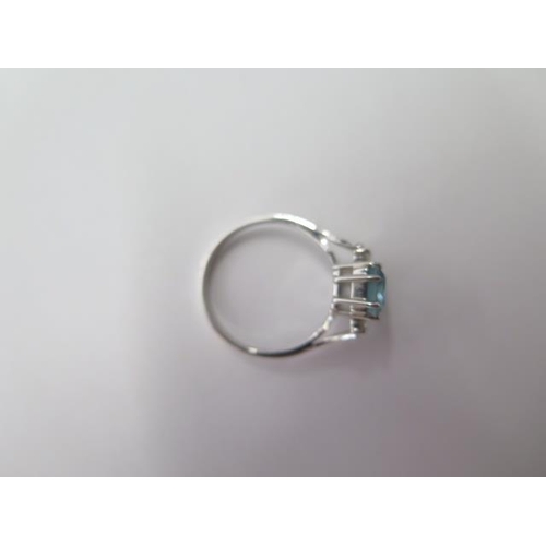 476 - A hallmarked 18ct white gold aquamarine and diamond ring, size P, approx 4.3 grams, aquamarine appro... 