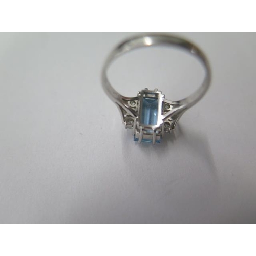 476 - A hallmarked 18ct white gold aquamarine and diamond ring, size P, approx 4.3 grams, aquamarine appro... 