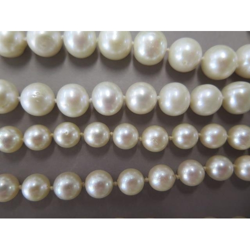 481 - Two long strings of pearls, 94cm and 90cm long, pearls approx 8mm x 8mm and 5mm x 5mm