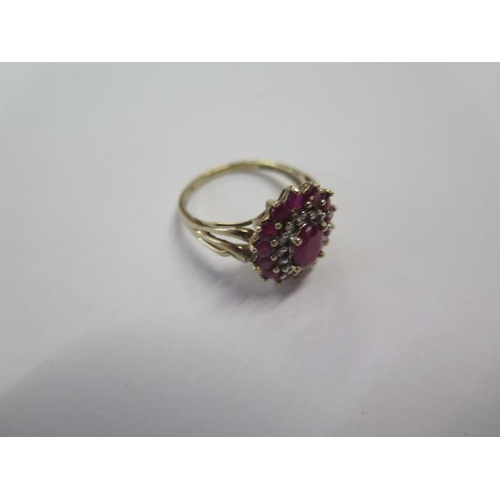 482 - A 9ct yellow gold ruby and diamond ring, size O, approx 3.5 grams, in good condition