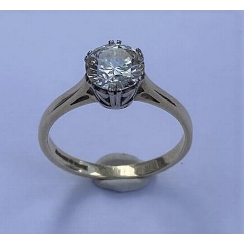 483 - A hallmarked 18ct yellow gold diamond solitaire ring, the brilliant cut diamond approx 1.20ct, diamo... 