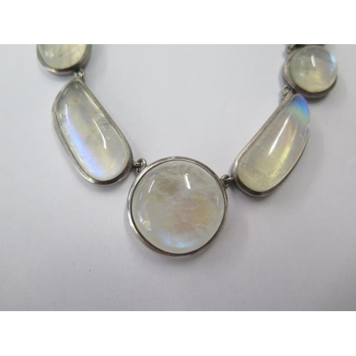 497 - A moonstone white metal necklace and earrings, necklace 41cm long, missing one end loop otherwise go... 