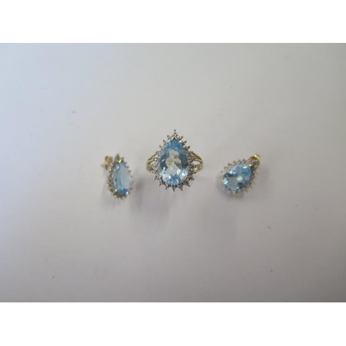 500 - A 9ct yellow and white gold pear shaped ring possibly blue topaz, size L, with a matching pair of ea... 