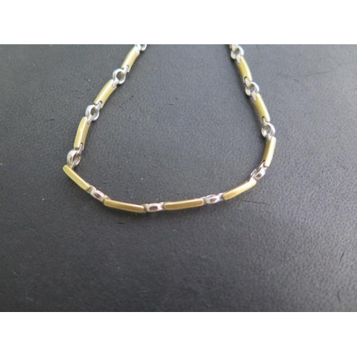 501 - A hallmarked 18ct yellow and whit gold necklace, 42cm long, approx 19.5 grams, clasp good