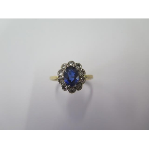 504 - An 18ct hallmarked sapphire and diamond ring, head approx 13mm x 11mm, size P, approx 3.4 grams, gen... 