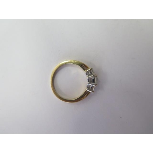 509 - An 18ct yellow gold diamond trilogy ring, approx 0.53ct, size K, approx 3.6 grams, generally good co... 