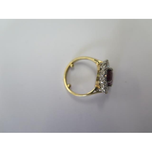 515 - A vintage 18ct yellow gold ruby and diamond ring, ruby approx 2.5ct, diamond approx 1.25ct, size N w... 