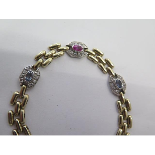 529 - A 9ct yellow and white gold multi gem link bracelet 18cm long, approx 11.4 grams, in good condition