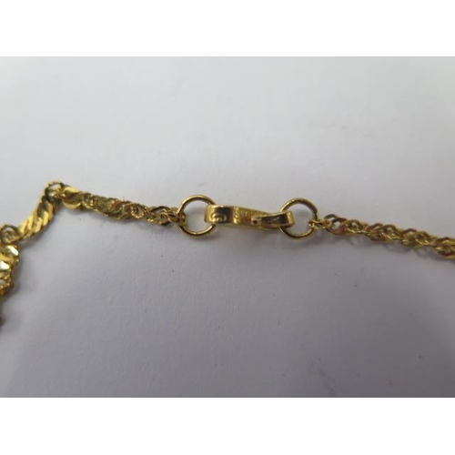 532 - An 850 yellow gold pendant and a 915 gold 46cm chain, both good, total weight approx 6.1 grams