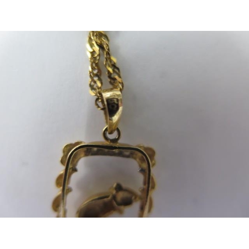 532 - An 850 yellow gold pendant and a 915 gold 46cm chain, both good, total weight approx 6.1 grams