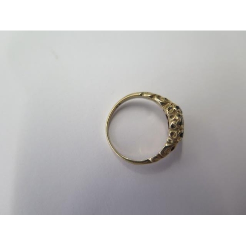 534 - A 9ct yellow gold seven stone ring, size J, approx 2.6 grams, some wear but generally good