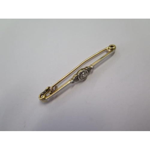 535 - A yellow gold diamond bar brooch, 52mm long, approx 4.3 grams, tests to approx 18ct, some bending to... 