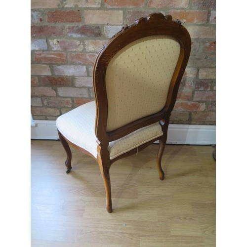 57 - A 19th century carved walnut upholstered side chair, recently reupholstered