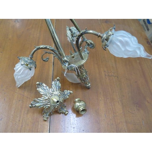 68 - A good brass three branch ceiling light with glass flame shades, 54cm tall x 41cm wide