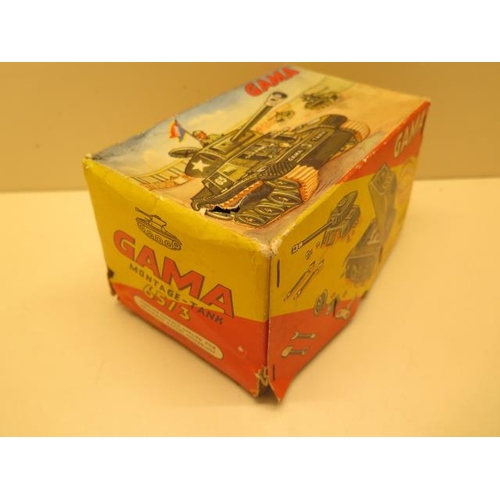 746 - A Gama tinplate clockwork Montage - Tank, 16cm long, boxed, motor runs, guns action, track does not ... 