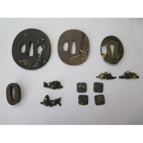 755 - Three Japanese tsuba sword guards and 8 decorations and a collar