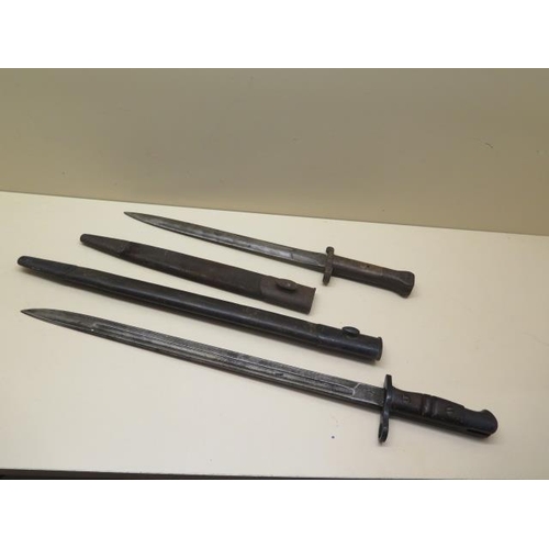 757 - Two British bayonets, both with scabbards, blade lengths 42.5cm and 30cm