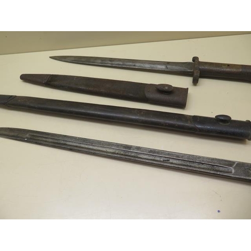 757 - Two British bayonets, both with scabbards, blade lengths 42.5cm and 30cm