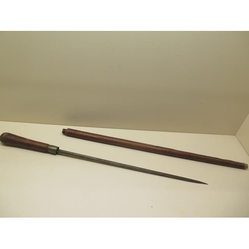 758 - An early 1900s Indian sword stick with leather grip and scabbard, blade length 53cm, total length 91... 