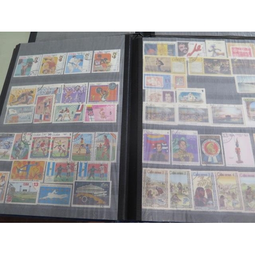 803 - Three albums of World stamps