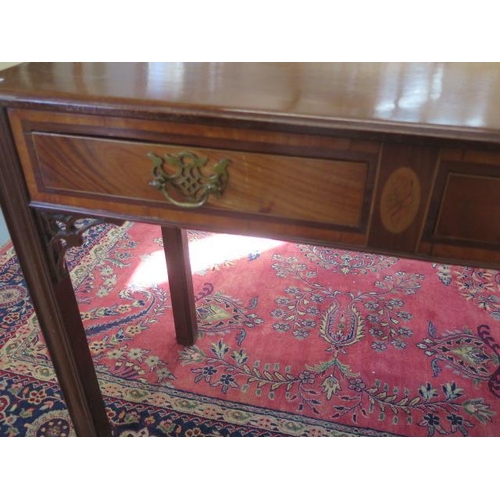 87 - A mahogany 2 drawer side table with fretwork supports, 72cm tall x 90cm x 44cm