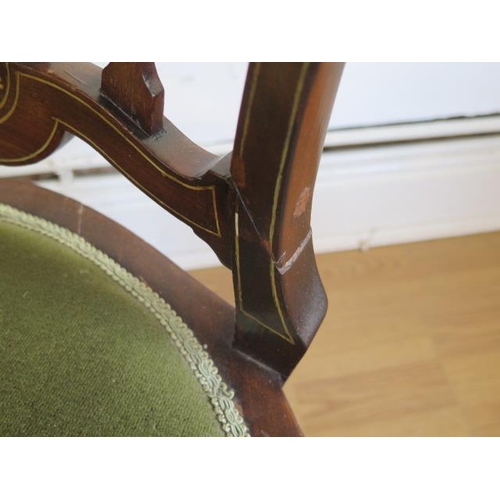 88 - An Edwardian inlaid open armchair, old repair to back