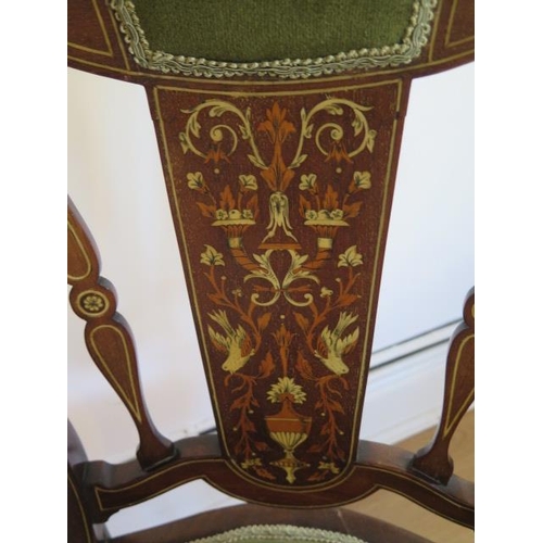 88 - An Edwardian inlaid open armchair, old repair to back