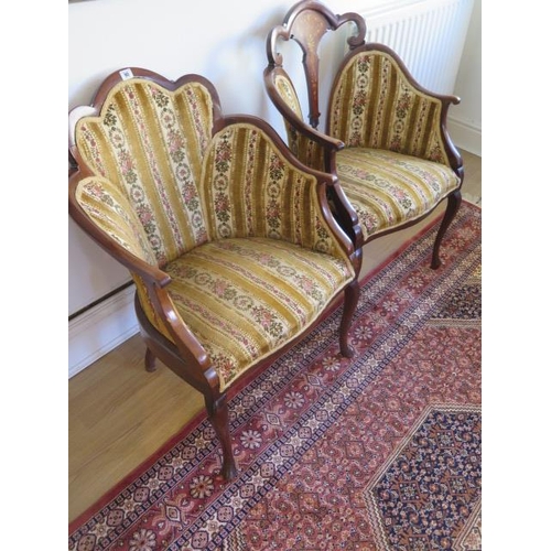 90 - A pair of early 1900s ladies and gentleman upholstered mahogany side chairs