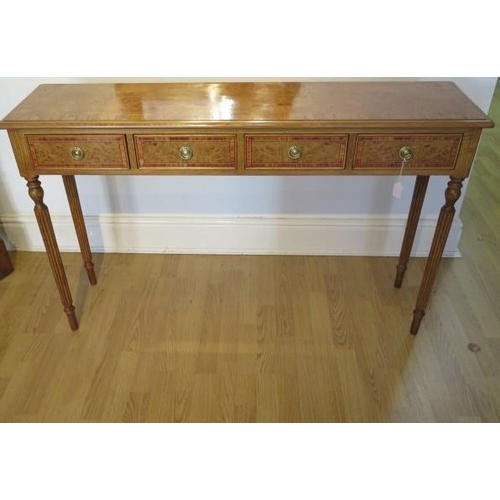 13 - A new burr oak four drawer hall table on turned reeded legs, made by a local craftsman to a high sta... 