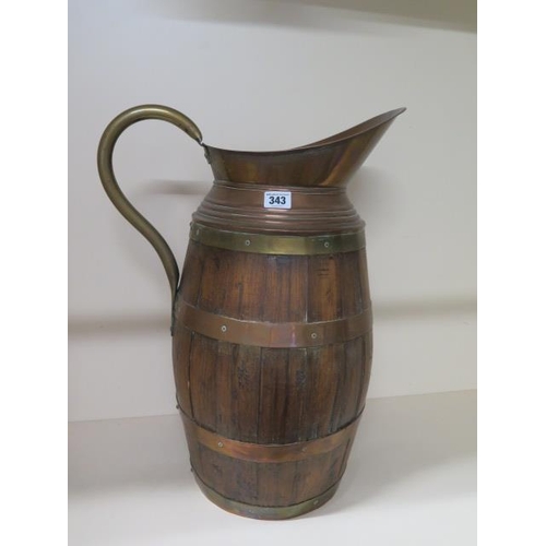 19 - A copper banded wooden water carrier jug, 55cm tall