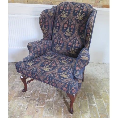 21 - A good modern Queen Anne style wing back upholstered armchair, 119cm tall x 84cm x 83cm deep