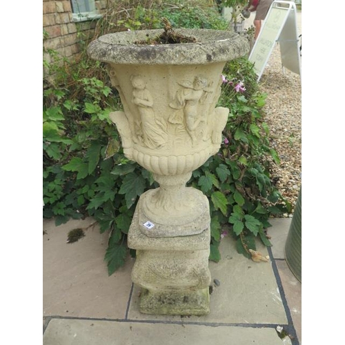 29 - A stone effect Campana style urn on stand, nicely weathered, 95cm tall