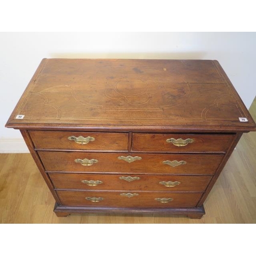 51 - An 18th century line inlaid walnut 5 drawer chest with panelled sides and back on shaped bracket fee... 