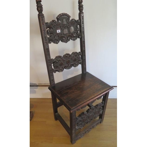 66 - A carved solid seat hall chair, 123cm tall x 51cm wide, some old worm damage, removed from a Country... 