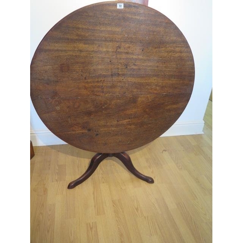 72 - A Georgian mahogany tilt top table on a tripod base, 71cm tall x 98xm diameter