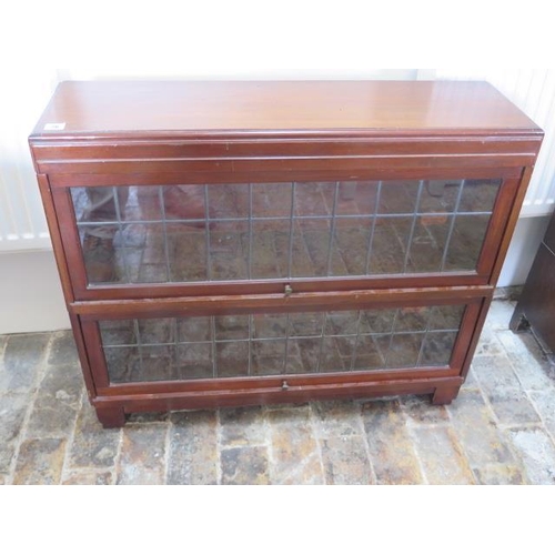 76 - A mahogany two section Globe Wernicke Classic no 109 1/2 stacking bookcase with leaded glass - glass... 