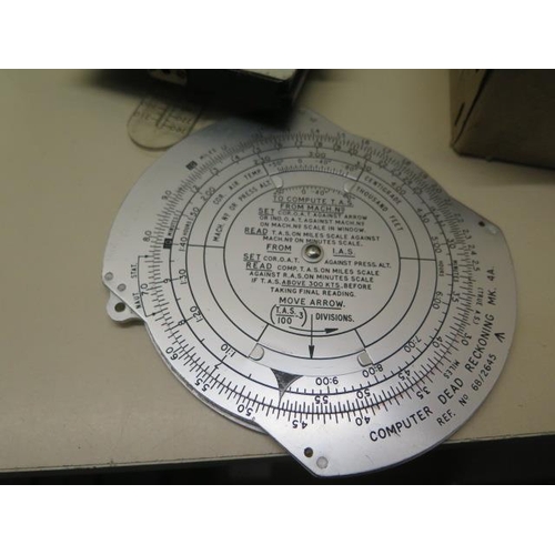 802 - A P-12 RAF compass, an Air Speed calculator MK11A, a Navigational computer MK 111H, a part circular ... 