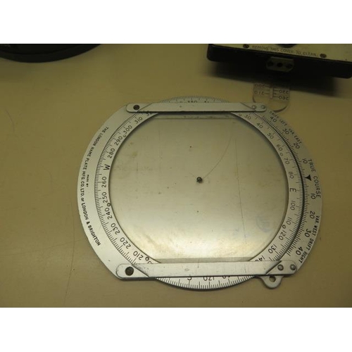 802 - A P-12 RAF compass, an Air Speed calculator MK11A, a Navigational computer MK 111H, a part circular ... 