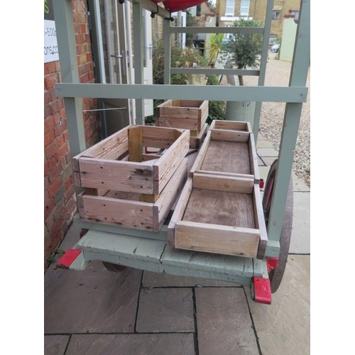 90 - A vintage wooden market barrow / stall with original 10 spoke wooden wheels and leaf spring suspensi... 