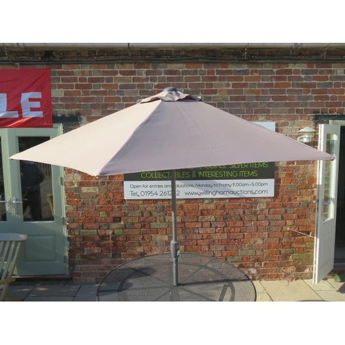 47 - A new boxed Four Seasons high quality taupe 250cm tilting parasol, free postage on this item (UK mai... 