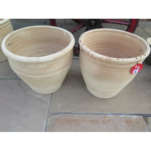 39 - A pair of frost proof Hara garden planters, 38cm tall