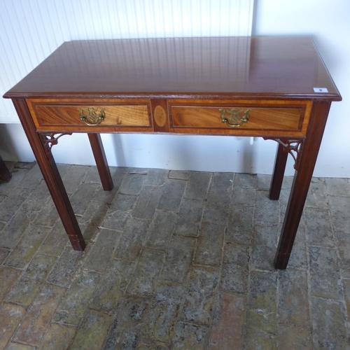 8 - A mahogany 2 drawer sidetable on square moulded legs in polished condition, 72cm tall x 89cm x 44cm