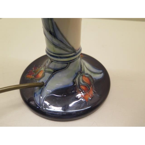 257 - A Moorcroft candlestick table lamp, 30cm tall, working, good condition