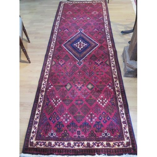 193 - A hand knotted woollen Meimeh rug, 3.23m x 1.10m